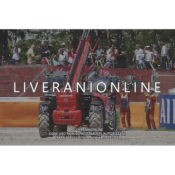 The Mercedes AMG F1 W07 Hybrid of race retiree Nico Rosberg (GER) Mercedes AMG F1 is craned away from the gravel trap at the start of the race. 15.05.2016. Formula 1 World Championship, Rd 5, Spanish Grand Prix, Barcelona, Spain, Race Day. AG ALDO LIVERANI SAS ONLY ITALY