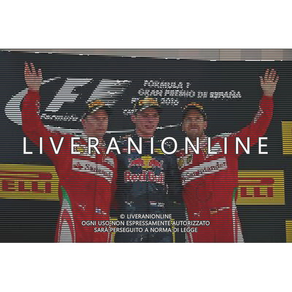 The podium (L to R): Kimi Raikkonen (FIN) Ferrari, second; Max Verstappen (NLD) Red Bull Racing, race winner; Sebastian Vettel (GER) Ferrari, third. 15.05.2016. Formula 1 World Championship, Rd 5, Spanish Grand Prix, Barcelona, Spain, Race Day. AG ALDO LIVERANI SAS ONLY ITALY