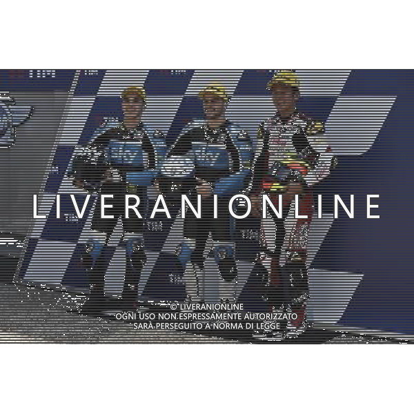 Andrea Migno (R) e Romano Fenati (C) Khairul Idham Pawi (L) festeggiano la qualifica per la gara di moto3 Â© PIAZZOLLA / AGENZIA ALDO LIVERANI SAS Motomondiale, Prove Qualifiche, Gran Premio d\'Italia TIM, Mugello 21/05/2016 