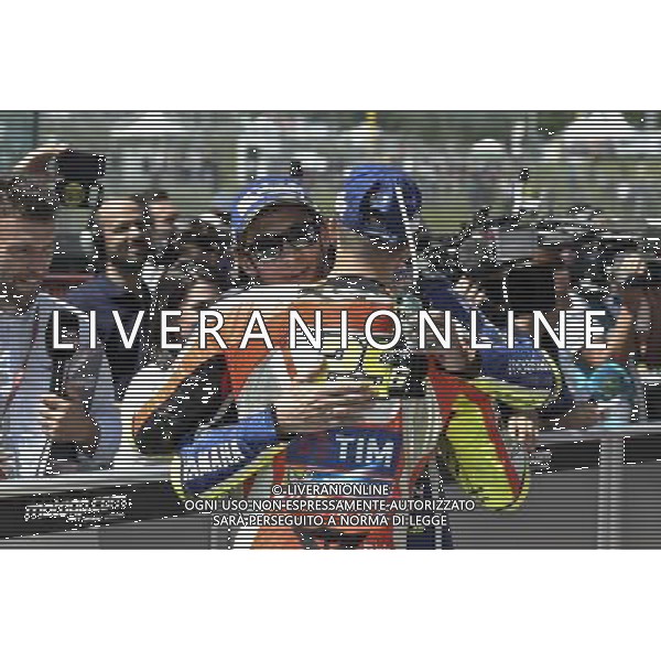Valentino Rossi e Andrea Iannone festeggiano la conquista della prima e terza posizione al Gran premio d\'italia. FOTO G. PIAZZOLO-AG ALDO LIVERANI SAS