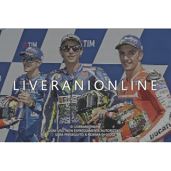 Maverick Vi–ales (L) Valentino Rossi (C) Andrea Iannone festeggia la conquista della partenza dalla prima fila al Gran premio d\'italia. FOTO G. PIAZZOLO-AG ALDO LIVERANI SAS