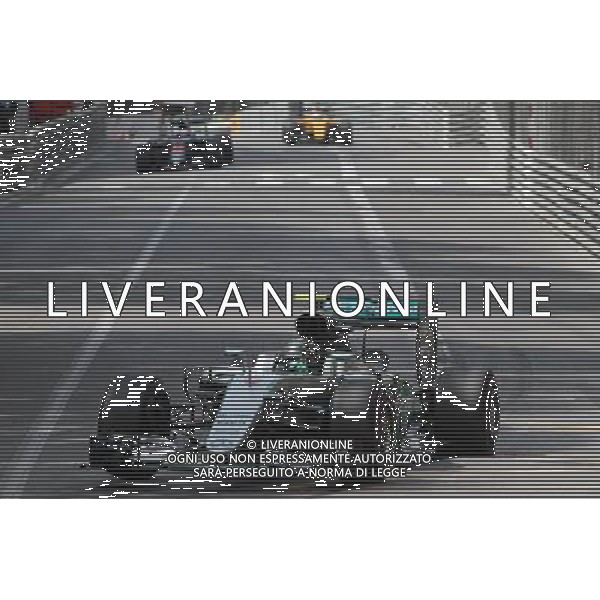 Nico Rosberg (GER) Mercedes AMG F1 W07 Hybrid with a punctured rear wheel. 26.05.2016. Formula 1 World Championship, Rd 6, Monaco Grand Prix, Monte Carlo, Monaco, Practice Day. AG ALDO LIVERANI SAS ONLY ITALY
