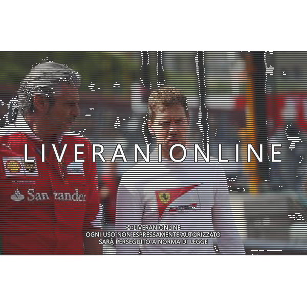 (L to R): Maurizio Arrivabene (ITA) Ferrari Team Principal with Sebastian Vettel (GER) Ferrari. 26.05.2016. Formula 1 World Championship, Rd 6, Monaco Grand Prix, Monte Carlo, Monaco, Practice Day. AG ALDO LIVERANI SAS ONLY ITALY