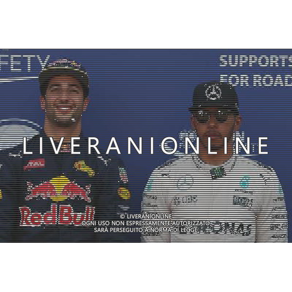 (L to R): Daniel Ricciardo (AUS) Red Bull Racing celebrates his pole position in parc ferme with third placed Lewis Hamilton (GBR) Mercedes AMG F1. 28.05.2016. Formula 1 World Championship, Rd 6, Monaco Grand Prix, Monte Carlo, Monaco, Qualifying Day. AG ALDO LIVERANI SAS ONLY ITALY 