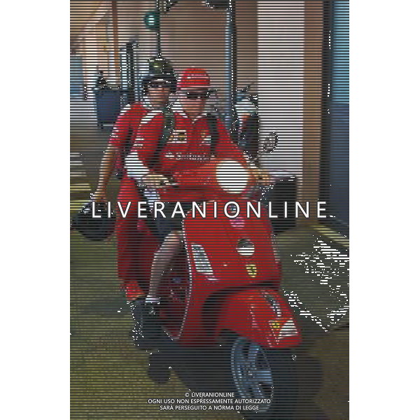 Kimi Raikkonen (FIN) Ferrari with Mark Arnall (GBR) Personal Trainer on his scooter. 28.05.2016. Formula 1 World Championship, Rd 6, Monaco Grand Prix, Monte Carlo, Monaco, Qualifying Day. AG ALDO LIVERANI SAS ONLY ITALY 