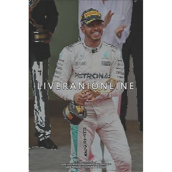 Race winner Lewis Hamilton (GBR) Mercedes AMG F1 celebrates on the podium. 29.05.2015. Formula 1 World Championship, Rd 6, Monaco Grand Prix, Monte Carlo, Monaco, Race Day. AG ALDO LIVERANI SAS ONLY ITALY