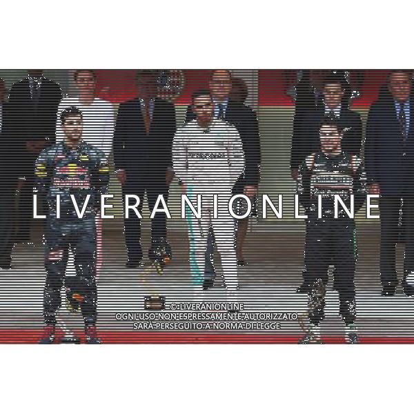 The podium (L to R): Daniel Ricciardo (AUS) Red Bull Racing, second; Lewis Hamilton (GBR) Mercedes AMG F1, race winner; Sergio Perez (MEX) Sahara Force India F1, third. 29.05.2015. Formula 1 World Championship, Rd 6, Monaco Grand Prix, Monte Carlo, Monaco, Race Day. AG ALDO LIVERANI SAS ONLY ITALY
