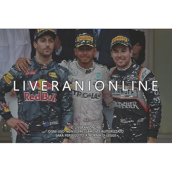 The podium (L to R): Daniel Ricciardo (AUS) Red Bull Racing, second; Lewis Hamilton (GBR) Mercedes AMG F1, race winner; Sergio Perez (MEX) Sahara Force India F1, third. 29.05.2015. Formula 1 World Championship, Rd 6, Monaco Grand Prix, Monte Carlo, Monaco, Race Day. AG ALDO LIVERANI SAS ONLY ITALY