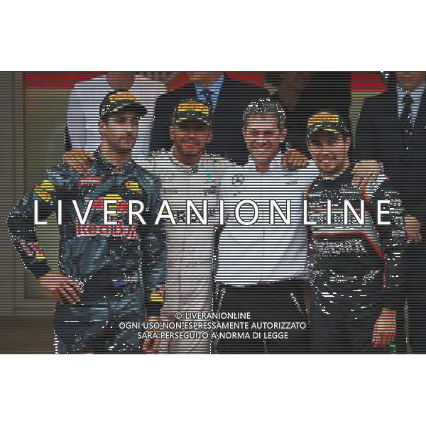 The podium (L to R): Daniel Ricciardo (AUS) Red Bull Racing, second; Lewis Hamilton (GBR) Mercedes AMG F1, race winner; Sergio Perez (MEX) Sahara Force India F1, third. 29.05.2015. Formula 1 World Championship, Rd 6, Monaco Grand Prix, Monte Carlo, Monaco, Race Day. AG ALDO LIVERANI SAS ONLY ITALY
