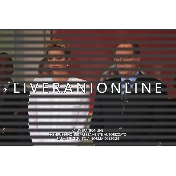 HSH Prince Albert of Monaco (MON) with Princess Charlene of Monaco at the podium. 29.05.2015. Formula 1 World Championship, Rd 6, Monaco Grand Prix, Monte Carlo, Monaco, Race Day. AG ALDO LIVERANI SAS ONLY ITALY