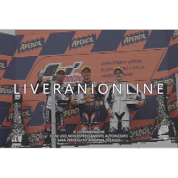 Misano Adriatico ( RN ) 16/09/2012 Gran Premio Aperol di San Marino e della Riviera di Rimini 2012 - Moto3 Premiazione Nella foto: 2 Class. Luis SALOM ( ESP ) su KALEX KTM, il vincitore Sandro CORTESE ( GER ) su KTM e 3* class. Romano FENATI ( ITA ) su FTR HHONDA sul podio PH Lauro Montagnini AG ALDO LIVERANI SAS