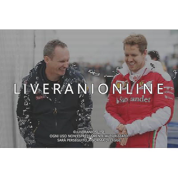(L to R): Paul Monaghan (GBR) Red Bull Racing Chief Engineer with Sebastian Vettel (GER) Ferrari. 09.06.2016. Formula 1 World Championship, Rd 7, Canadian Grand Prix, Montreal, Canada, Preparation Day. AG ALDO LIVERANI SAS ONLY ITALY