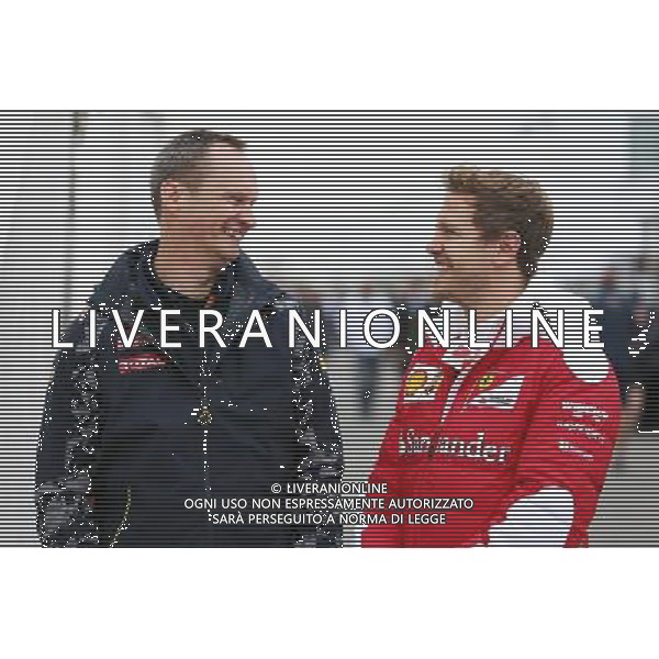 (L to R): Paul Monaghan (GBR) Red Bull Racing Chief Engineer with Sebastian Vettel (GER) Ferrari. 09.06.2016. Formula 1 World Championship, Rd 7, Canadian Grand Prix, Montreal, Canada, Preparation Day. AG ALDO LIVERANI SAS ONLY ITALY
