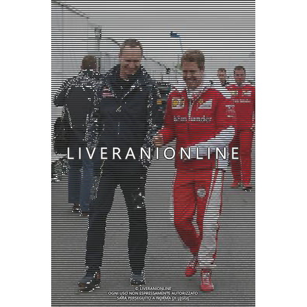 (L to R): Paul Monaghan (GBR) Red Bull Racing Chief Engineer with Sebastian Vettel (GER) Ferrari. 09.06.2016. Formula 1 World Championship, Rd 7, Canadian Grand Prix, Montreal, Canada, Preparation Day. AG ALDO LIVERANI SAS ONLY ITALY