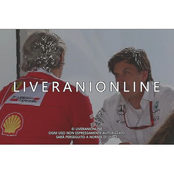 (L to R): Maurizio Arrivabene (ITA) Ferrari Team Principal with Toto Wolff (GER) Mercedes AMG F1 Shareholder and Executive Director. 10.06.2016. Formula 1 World Championship, Rd 7, Canadian Grand Prix, Montreal, Canada, Practice Day. AG ALDO LIVERANI SAS ONLY ITALY