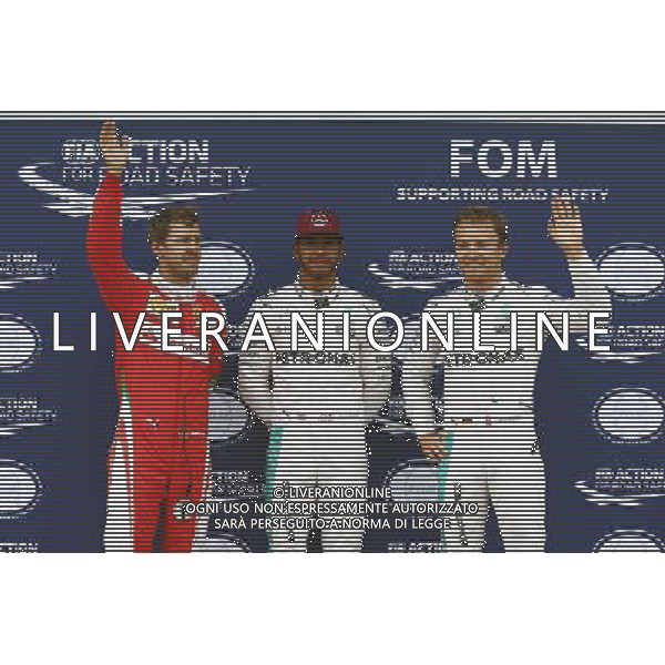 Qualifying top three in parc ferme (L to R): Sebastian Vettel (GER) Ferrari, third; Lewis Hamilton (GBR) Mercedes AMG F1, pole position; Nico Rosberg (GER) Mercedes AMG F1, second. 11.06.2016. Formula 1 World Championship, Rd 7, Canadian Grand Prix, Montreal, Canada, Qualifying Day. AG ALDO LIVERANI SAS ONLY ITALY