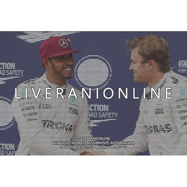 (L to R): Lewis Hamilton (GBR) Mercedes AMG F1 celebrates his pole position with team mate Nico Rosberg (GER) Mercedes AMG F1. 11.06.2016. Formula 1 World Championship, Rd 7, Canadian Grand Prix, Montreal, Canada, Qualifying Day. AG ALDO LIVERANI SAS ONLY ITALY