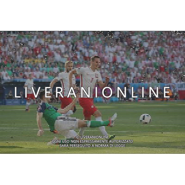NICEA 12.06.2016 MECZ I RUNDA GRUPA C MISTRZOSTW EUROPY 2016: POLSKA - IRLANDIA POLNOCNA --- FIRST ROUND GROUP C UEFA EURO 2016 MATCH IN NICE: POLAND - NORTHERN IRELAND CONOR MCLAUGHLIN ARKADIUSZ MILIK FOT. PIOTR KUCZA/NEWSPIX.PL --- Newspix.pl / AGENZIA ALDO LIVERANI SAS - ITALY ONLY EDITORIAL USE ONLY - Polonia - Irlanda del Nord UEFA Francia EURO 2016 Final Tournament Group Stage C Nizza - 12.06.2016