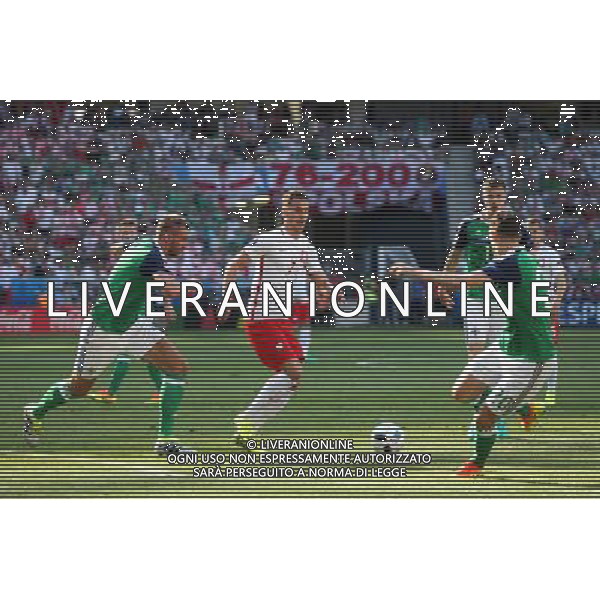NICEA 12.06.2016 MECZ I RUNDA GRUPA C MISTRZOSTW EUROPY 2016: POLSKA - IRLANDIA POLNOCNA --- FIRST ROUND GROUP C UEFA EURO 2016 MATCH IN NICE: POLAND - NORTHERN IRELAND GARETH MCAULEY ARKADIUSZ MILIK CRAIG CATHCART FOT. PIOTR KUCZA/NEWSPIX.PL --- Newspix.pl / AGENZIA ALDO LIVERANI SAS - ITALY ONLY EDITORIAL USE ONLY - Polonia - Irlanda del Nord UEFA Francia EURO 2016 Final Tournament Group Stage C Nizza - 12.06.2016