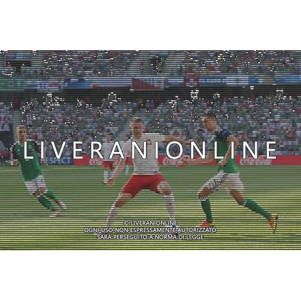 NICEA 12.06.2016 MECZ I RUNDA GRUPA C MISTRZOSTW EUROPY 2016: POLSKA - IRLANDIA POLNOCNA --- FIRST ROUND GROUP C UEFA EURO 2016 MATCH IN NICE: POLAND - NORTHERN IRELAND ARTUR JEDRZEJCZYK CRAIG CATHCART FOT. PIOTR KUCZA/NEWSPIX.PL --- Newspix.pl / AGENZIA ALDO LIVERANI SAS - ITALY ONLY EDITORIAL USE ONLY - Polonia - Irlanda del Nord UEFA Francia EURO 2016 Final Tournament Group Stage C Nizza - 12.06.2016