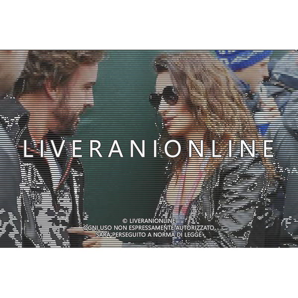 (L to R): Fernando Alonso (ESP) McLaren with Penelope Cruz (ESP) Actress. 12.06.2016. Formula 1 World Championship, Rd 7, Canadian Grand Prix, Montreal, Canada, Race Day. AG ALDO LIVERANI SAS ONLY ITALY