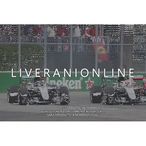 (L to R): Nico Rosberg (GER) Mercedes AMG F1 W07 Hybrid and team mate Lewis Hamilton (GBR) Mercedes AMG F1 W07 Hybrid at the start of the race. 12.06.2016. Formula 1 World Championship, Rd 7, Canadian Grand Prix, Montreal, Canada, Race Day. AG ALDO LIVERANI SAS ONLY ITALY