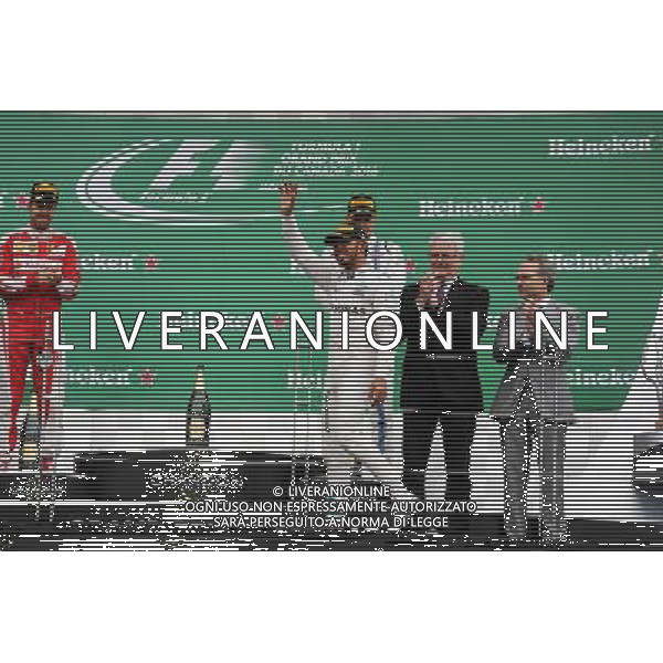 Race winner Lewis Hamilton (GBR) Mercedes AMG F1 celebrates on the podium. 12.06.2016. Formula 1 World Championship, Rd 7, Canadian Grand Prix, Montreal, Canada, Race Day. AG ALDO LIVERANI SAS ONLY ITALY