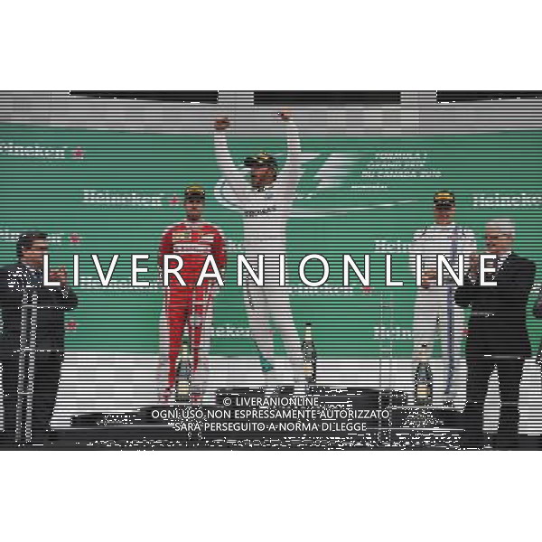 Race winner Lewis Hamilton (GBR) Mercedes AMG F1 W07 Hybrid celebrates on the podium. 12.06.2016. Formula 1 World Championship, Rd 7, Canadian Grand Prix, Montreal, Canada, Race Day. AG ALDO LIVERANI SAS ONLY ITALY