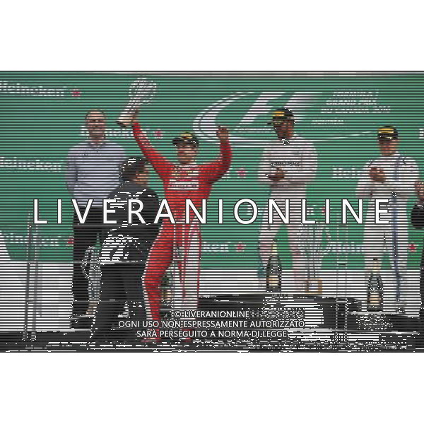 The podium (L to R): Sebastian Vettel (GER) Ferrari, second; Lewis Hamilton (GBR) Mercedes AMG F1, race winner; Valtteri Bottas (FIN) Williams, third. 12.06.2016. Formula 1 World Championship, Rd 7, Canadian Grand Prix, Montreal, Canada, Race Day. AG ALDO LIVERANI SAS ONLY ITALY