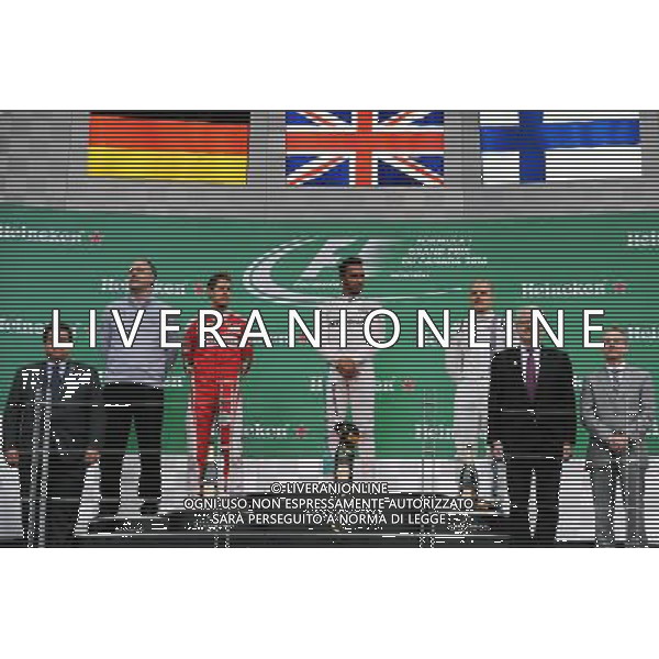 The podium (L to R): Sebastian Vettel (GER) Ferrari, second; Lewis Hamilton (GBR) Mercedes AMG F1, race winner; Valtteri Bottas (FIN) Williams, third. 12.06.2016. Formula 1 World Championship, Rd 7, Canadian Grand Prix, Montreal, Canada, Race Day. AG ALDO LIVERANI SAS ONLY ITALY