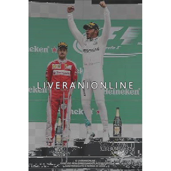 Race winner Lewis Hamilton (GBR) Mercedes AMG F1 celebrates on the podium. 12.06.2016. Formula 1 World Championship, Rd 7, Canadian Grand Prix, Montreal, Canada, Race Day. AG ALDO LIVERANI SAS ONLY ITALY