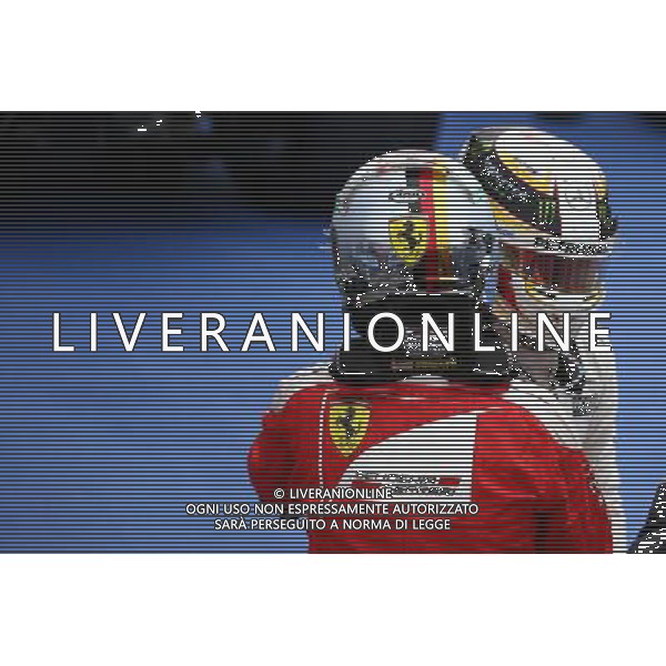 Sebastian Vettel (GER) Scuderia Ferrari SF16-H and Lewis Hamilton (GBR) Mercedes AMG F1 W07 . 12.06.2016. Formula 1 World Championship, Rd 7, Canadian Grand Prix, Montreal, Canada, Race Day. AG ALDO LIVERANI SAS ONLY ITALY