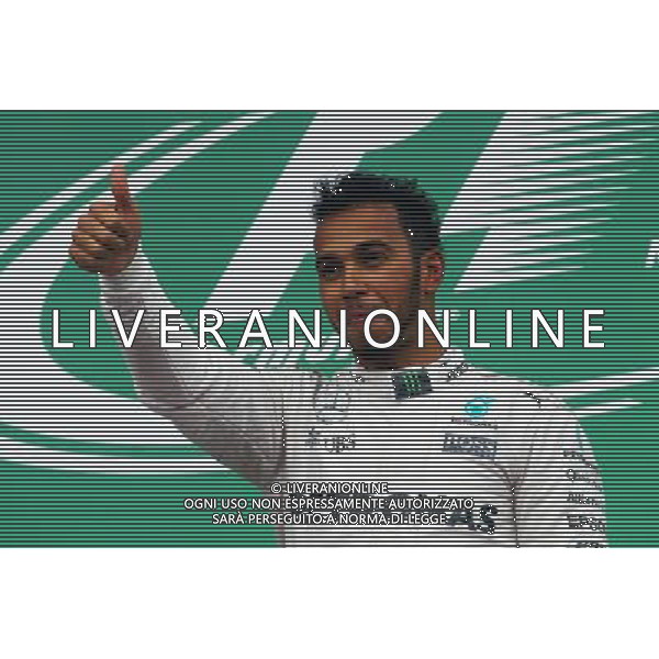 Race winner Lewis Hamilton (GBR) Mercedes AMG F1 celebrates on the podium. 12.06.2016. Formula 1 World Championship, Rd 7, Canadian Grand Prix, Montreal, Canada, Race Day. AG ALDO LIVERANI SAS ONLY ITALY