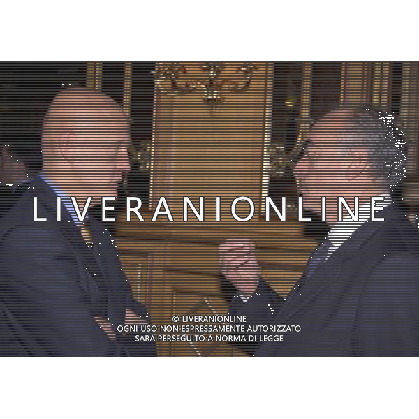 MILANO 17-12-1998 HOTEL PRINCIPE DI SAVOIA FESTA NATALIZIA DELLA LEGA NAZIONALE CALCIO NELLA FOTO PIERLUIGI COLLINA CON ANTONIO GIRAUDO AG ALDO LIVERANI SAS