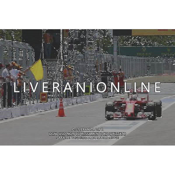 Sebastian Vettel (GER) Ferrari SF16-H passes a traffic cone where a drain cover had come away. 18.06.2016. Formula 1 World Championship, Rd 8, European Grand Prix, Baku Street Circuit, Azerbaijan, Qualifying Day. / AGENZIA ALDO LIVERANI SAS - Motor Racing - Formula One World Championship - European Grand Prix - Qualifying Day - Baku, Azerbaijan 18.06.2016 - Prove Ufficiali Qualifiche / ITALY ONLY EDITORIAL USE ONLY 