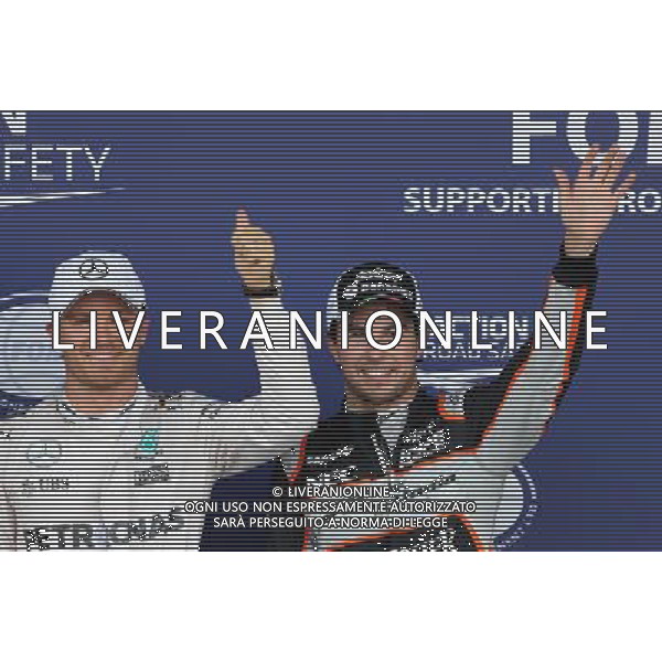Nico Rosberg (GER), Mercedes AMG F1 Team and Sergio Perez (MEX), Sahara Force India 18.06.2016. Formula 1 World Championship, Rd 8, European Grand Prix, Baku Street Circuit, Azerbaijan, Qualifying Day. AG ALDO LIVERANI SAS ONLY ITALY