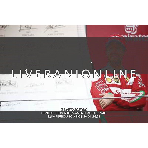 Sebastian Vettel (GER) Ferrari celebrates his second position on the podium. 19.06.2016. Formula 1 World Championship, Rd 8, European Grand Prix, Baku Street Circuit, Azerbaijan, Race Day. AG ALDO LIVERANI SAS ONLY ITALY