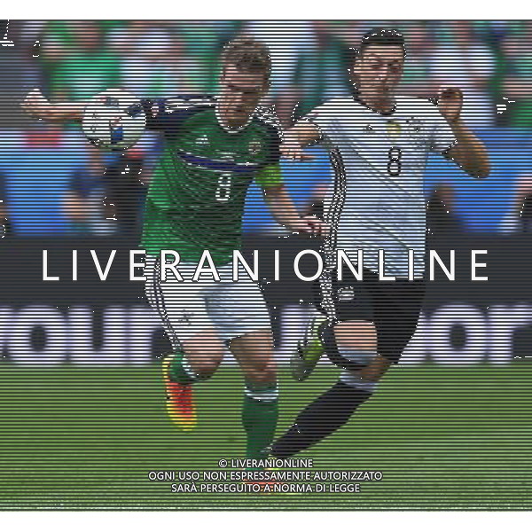 UEFA Francia EURO 2016 Final Tournament Group Stage C Parigi - 21.06.2016 Irlanda del Nord-Germania Nella Foto:Davis Steven-Ozil Mesut /Ph.Vitez-Ag. Aldo Liverani