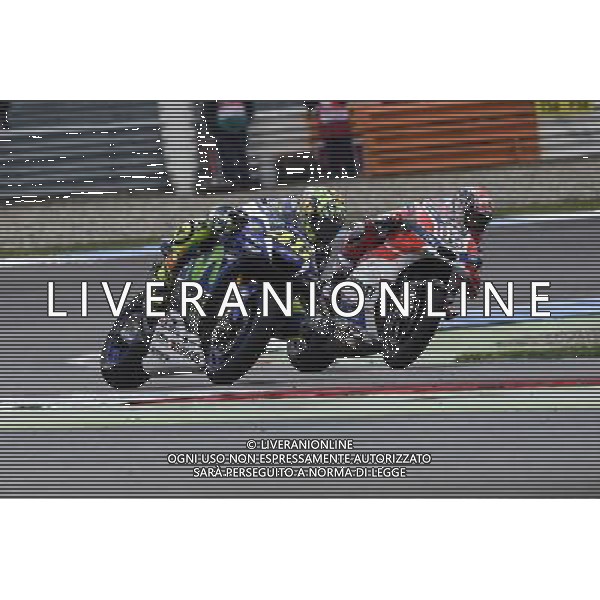 26.06.2016. Assen, Olanda.Valentino Rossi (Movistar Yamaha) e Andrea Dovizioso (Ducati Team) durante la gara. FOTO G.PIAZZOLLA-AG ALDO LIVERANI SAS