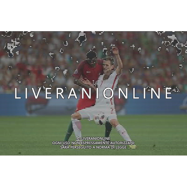 MARSYLIA 30.06.2016 MECZ CWIERCFINAL 1/4 FINALU MISTRZOSTW EUROPY 2016: POLSKA - PORTUGALIA --- QUARTERFINAL 1/4 FINAL UEFA EURO 2016 MATCH IN MARSEILLE: POLAND - PORTUGAL WILLIAM CARVALHO ARKADIUSZ MILIK FOT. PIOTR KUCZA/NEWSPIX.PL --- Newspix.pl 30 -06-2016 MARSIGLIA EURO 2016 QUARTI DI FINALE POLONIA -PORTOGALLO AG ALDO LIVERANI SAS ONLY ITALY *** Local Caption *** www.newspix.pl mail us: info@newspix.pl call us: 0048 022 23 22 222 --- Polish Picture Agency by Ringier Axel Springer Poland