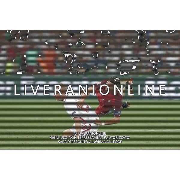 MARSYLIA 30.06.2016 MECZ CWIERCFINAL 1/4 FINALU MISTRZOSTW EUROPY 2016: POLSKA - PORTUGALIA --- QUARTERFINAL 1/4 FINAL UEFA EURO 2016 MATCH IN MARSEILLE: POLAND - PORTUGAL KAMIL GLIK CRISTIANO RONALDO FOT. PIOTR KUCZA/NEWSPIX.PL --- Newspix.pl 30 -06-2016 MARSIGLIA EURO 2016 QUARTI DI FINALE POLONIA -PORTOGALLO AG ALDO LIVERANI SAS ONLY ITALY *** Local Caption *** www.newspix.pl mail us: info@newspix.pl call us: 0048 022 23 22 222 --- Polish Picture Agency by Ringier Axel Springer Poland