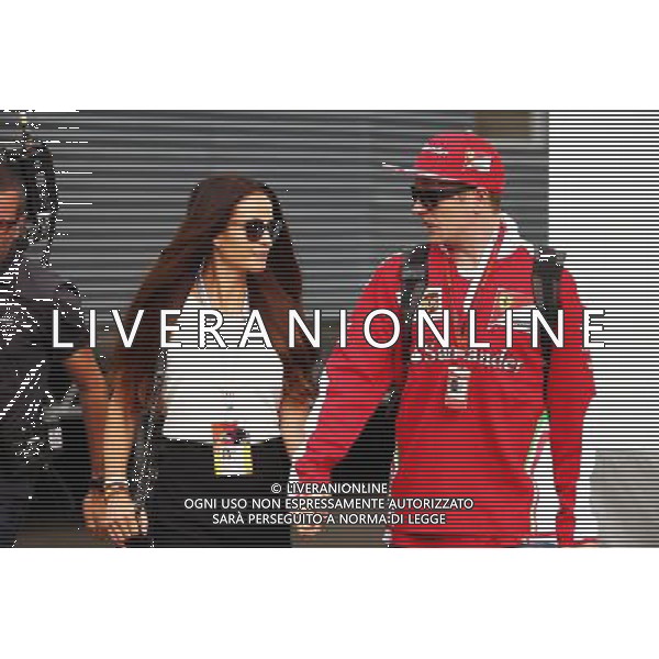 Kimi Raikkonen (FIN) Ferrari with his wife Minttu Virtanen (FIN). 01.07.2016. Formula 1 World Championship, Rd 9, Austrian Grand Prix, Spielberg, Austria, Practice Day. AG ALDO LIVERANI SAS ONLY ITALY 