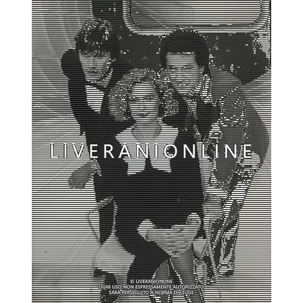 Emidio Remigi detto Memo cantante, paroliere e conduttore radiofonico italiano - Retrospettiva nella foto con Loretta Goggi e Gianni Brezza nel 1984 © ARCHIVIO / AGENZIA ALDO LIVERANI SAS 