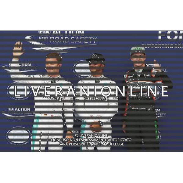 Qualifying top three in parc ferme (L to R): Nico Rosberg (GER) Mercedes AMG F1, second; Lewis Hamilton (GBR) Mercedes AMG F1, pole position; Nico Hulkenberg (GER) Sahara Force India F1, third. 02.07.2016. Formula 1 World Championship, Rd 9, Austrian Grand Prix, Spielberg, Austria, Qualifying Day. / AGENZIA ALDO LIVERANI SAS - ITALY ONLY EDITORIAL USE ONLY 