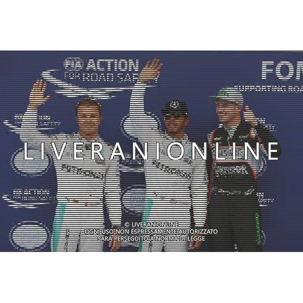 Qualifying top three in parc ferme (L to R): Nico Rosberg (GER) Mercedes AMG F1, second; Lewis Hamilton (GBR) Mercedes AMG F1, pole position; Nico Hulkenberg (GER) Sahara Force India F1, third. 02.07.2016. Formula 1 World Championship, Rd 9, Austrian Grand Prix, Spielberg, Austria, Qualifying Day. / AGENZIA ALDO LIVERANI SAS - ITALY ONLY EDITORIAL USE ONLY 
