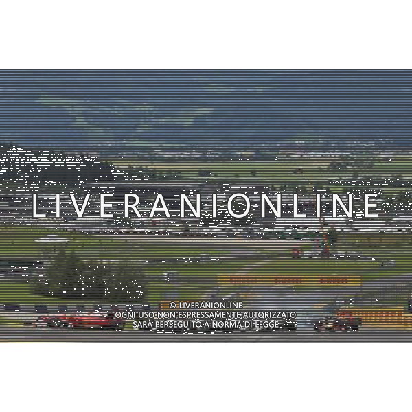 Kimi Raikkonen (FIN) Ferrari SF16-H leads Nico Hulkenberg (GER) Sahara Force India F1 VJM09 at the start of the race. 03.07.2016. Formula 1 World Championship, Rd 9, Austrian Grand Prix, Spielberg, Austria, Race Day. AG ALDO LIVERANI SAS ONLY ITALY