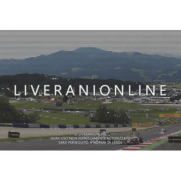 Nico Rosberg (GER) Mercedes AMG F1 W07 Hybrid and Esteban Gutierrez (MEX) Haas F1 Team VF-16. 03.07.2016. Formula 1 World Championship, Rd 9, Austrian Grand Prix, Spielberg, Austria, Race Day. AG ALDO LIVERANI SAS ONLY ITALY
