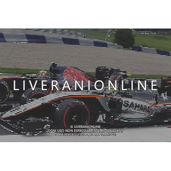 Carlos Sainz Jr (ESP) Scuderia Toro Rosso STR11 and Sergio Perez (MEX) Sahara Force India F1 VJM09 battle for position. 03.07.2016. Formula 1 World Championship, Rd 9, Austrian Grand Prix, Spielberg, Austria, Race Day. AG ALDO LIVERANI SAS ONLY ITALY