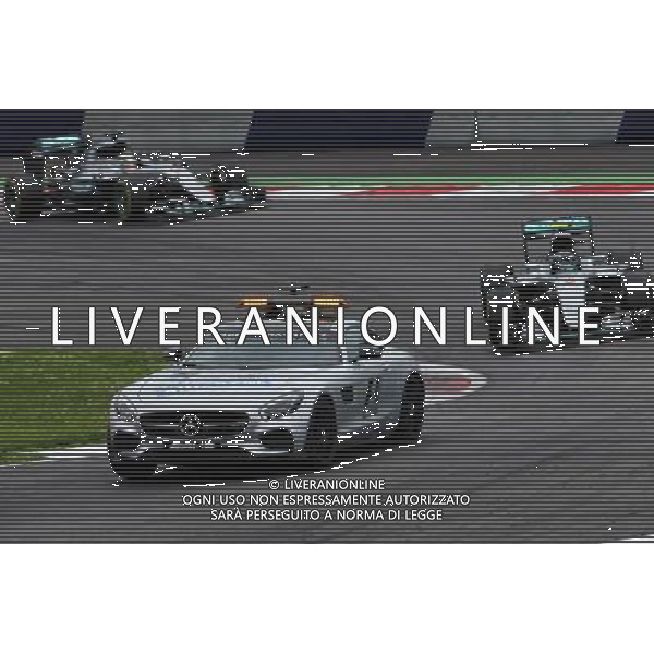 Nico Rosberg (GER) Mercedes AMG F1 W07 Hybrid leads behind the FIA Safety Car. 03.07.2016. Formula 1 World Championship, Rd 9, Austrian Grand Prix, Spielberg, Austria, Race Day. AG ALDO LIVERANI SAS ONLY ITALY