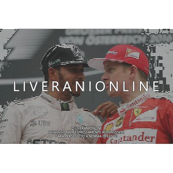 (L to R): Race winner with Lewis Hamilton (GBR) Mercedes AMG F1 on the podium. 03.07.2016. Formula 1 World Championship, Rd 9, Austrian Grand Prix, Spielberg, Austria, Race Day. AG ALDO LIVERANI SAS ONLY ITALY